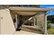 Covered carport with access to the house at 40 Sandra Cir, New Smyrna Beach, FL 32168