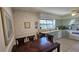 Kitchen with light-colored cabinets, tile flooring, and a dining area at 40 Sandra Cir, New Smyrna Beach, FL 32168