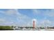 Lighthouse and marina with many boats at 40 Sandra Cir, New Smyrna Beach, FL 32168