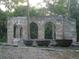 Historic sugar mill ruins with large iron pots at 40 Sandra Cir, New Smyrna Beach, FL 32168