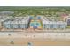 Aerial view of beachfront property with pools and parking at 4151 S Atlantic Ave # 112, New Smyrna Beach, FL 32169
