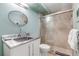 Bathroom has a large walk-in shower and modern vanity at 4151 S Atlantic Ave # 112, New Smyrna Beach, FL 32169
