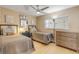 Bedroom with twin beds, dresser, and light wood floors at 4151 S Atlantic Ave # 112, New Smyrna Beach, FL 32169