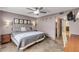 Bright bedroom with a king-size bed and access to a bathroom at 4151 S Atlantic Ave # 112, New Smyrna Beach, FL 32169
