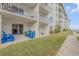 Ground level condo with private patio and walkway to the building at 4151 S Atlantic Ave # 112, New Smyrna Beach, FL 32169