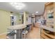 Open kitchen with granite counters and stainless steel appliances at 4151 S Atlantic Ave # 112, New Smyrna Beach, FL 32169