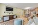 Living area features open concept design and comfortable seating at 4151 S Atlantic Ave # 112, New Smyrna Beach, FL 32169