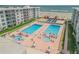Two pools, spa, and plenty of lounge chairs at 4151 S Atlantic Ave # 112, New Smyrna Beach, FL 32169