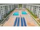 Two pools, shuffleboard, and ample lounge chairs at 4151 S Atlantic Ave # 112, New Smyrna Beach, FL 32169