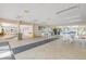 Spacious poolside seating area with tables and chairs at 4151 S Atlantic Ave # 112, New Smyrna Beach, FL 32169