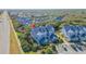 Aerial view of property; beach and community nearby at 4278 Sun Village Ct # 27D, New Smyrna Beach, FL 32169