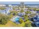 Aerial view of community, pool, and oceanfront location at 4278 Sun Village Ct # 27D, New Smyrna Beach, FL 32169