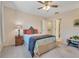 Well-lit bedroom featuring a double bed and a side table at 4278 Sun Village Ct # 27D, New Smyrna Beach, FL 32169