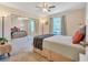 Bright bedroom with mirrored closet doors and neutral decor at 4278 Sun Village Ct # 27D, New Smyrna Beach, FL 32169