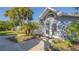 Community building with white doors and gray siding at 4278 Sun Village Ct # 27D, New Smyrna Beach, FL 32169