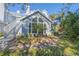 Updated condo building exterior with landscaping and a private staircase at 4278 Sun Village Ct # 27D, New Smyrna Beach, FL 32169