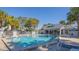 Relaxing community pool with plenty of lounge chairs at 4278 Sun Village Ct # 27D, New Smyrna Beach, FL 32169