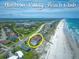 Aerial view of beach club near the ocean at 4670 Links Village Dr # C402, Ponce Inlet, FL 32127