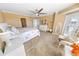 Spacious bedroom with king-size bed and dresser at 4670 Links Village Dr # C402, Ponce Inlet, FL 32127