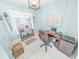 Bright home office with desk, chair, and globe at 4670 Links Village Dr # C402, Ponce Inlet, FL 32127