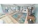 Spacious living room with comfortable seating and a view to the dining area at 4670 Links Village Dr # C402, Ponce Inlet, FL 32127
