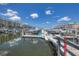 View of the community marina with docked boats at 4670 Links Village Dr # C402, Ponce Inlet, FL 32127