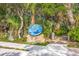 Entrance to Marine Science Center with lush landscaping at 4670 Links Village Dr # C402, Ponce Inlet, FL 32127