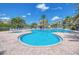 Resort-style pool with a spa and lounge area at 4670 Links Village Dr # C402, Ponce Inlet, FL 32127