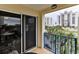 Balcony with sliding door access and partial ocean view at 5300 S Atlantic Ave # 13307, New Smyrna Beach, FL 32169