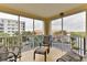 Screened balcony offers comfortable seating and partial view at 5300 S Atlantic Ave # 13307, New Smyrna Beach, FL 32169