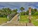 Convenient boardwalk path to the beach with outdoor shower at 5300 S Atlantic Ave # 13307, New Smyrna Beach, FL 32169