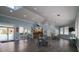 Bright and airy community room with kitchenette and seating area at 5300 S Atlantic Ave # 13307, New Smyrna Beach, FL 32169