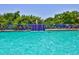 Inviting swimming pool with a cascading waterfall feature at 5300 S Atlantic Ave # 13307, New Smyrna Beach, FL 32169
