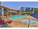 Relaxing community pool and spa area with plenty of lounge chairs at 5300 S Atlantic Ave # 13307, New Smyrna Beach, FL 32169