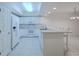 Bright, white kitchen with ample counter space and modern appliances at 5300 S Atlantic Ave # 9-304, New Smyrna Beach, FL 32169