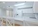 Bright white kitchen with breakfast bar at 5300 S Atlantic Ave # 9-304, New Smyrna Beach, FL 32169