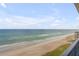 Balcony with a view of the beach and coastline at 5499 S Atlantic Ave # 905, New Smyrna Beach, FL 32169