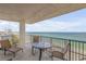 Spacious balcony with seating and ocean views at 5499 S Atlantic Ave # 905, New Smyrna Beach, FL 32169