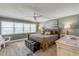 Calming main bedroom with wooden bedframe and ocean views at 5499 S Atlantic Ave # 905, New Smyrna Beach, FL 32169