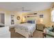 Guest bedroom with starfish decor, a comfortable bed, and a sitting area at 5499 S Atlantic Ave # 905, New Smyrna Beach, FL 32169