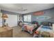 Bedroom with two twin beds, surf decor, and a large closet at 5499 S Atlantic Ave # 905, New Smyrna Beach, FL 32169