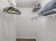 Walk-in closet with wire shelving and ample storage space at 5499 S Atlantic Ave # 905, New Smyrna Beach, FL 32169