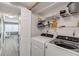 Laundry room with Whirlpool washer and dryer at 5499 S Atlantic Ave # 905, New Smyrna Beach, FL 32169