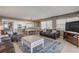 Coastal living room with leather furniture, white coffee table, and ocean views at 5499 S Atlantic Ave # 905, New Smyrna Beach, FL 32169