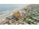 Aerial view of beachfront building and streets at 701 N Atlantic Ave # 203, New Smyrna Beach, FL 32169