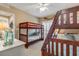Bedroom with two sets of bunk beds, creating a fun space for  at 701 N Atlantic Ave # 203, New Smyrna Beach, FL 32169