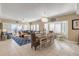 Open concept dining area with table and chairs at 701 N Atlantic Ave # 203, New Smyrna Beach, FL 32169