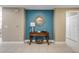 Bright entryway with decorative table and mirror at 701 N Atlantic Ave # 203, New Smyrna Beach, FL 32169