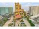 Building exterior, landscaping, and ocean views at 701 N Atlantic Ave # 203, New Smyrna Beach, FL 32169