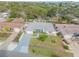 An aerial view of a house showing the surrounding neighborhood and its proximity to the ocean at 804 Sandpiper Ave, New Smyrna Beach, FL 32169